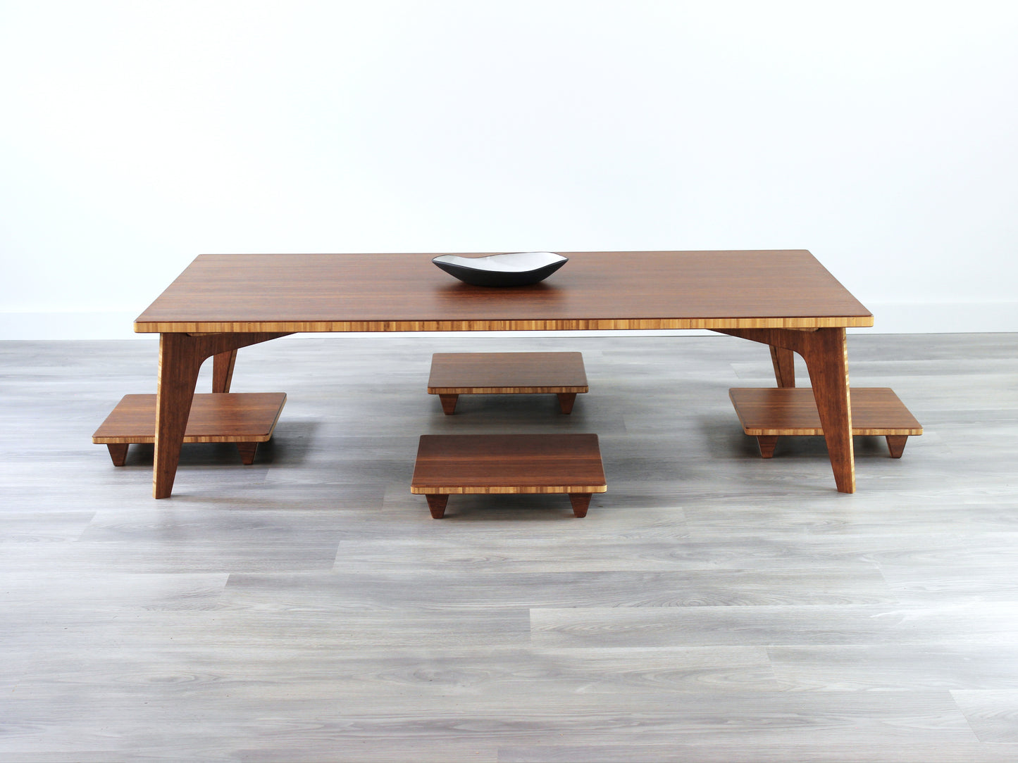Large Rectangle Table Set - Chestnut. Set on a grey floor, against a white background. Four Floor Chair Posture set underneath. A black pottery vessel on table top.
low table, coffee table, dining table, floor desk, floor chair, floor seating, low dining table, chabudai, tatami, kotatsu, minimalist, minimalist table,
modern, japanese low table, japanese table, kotatsu, large coffee table,
large dining table