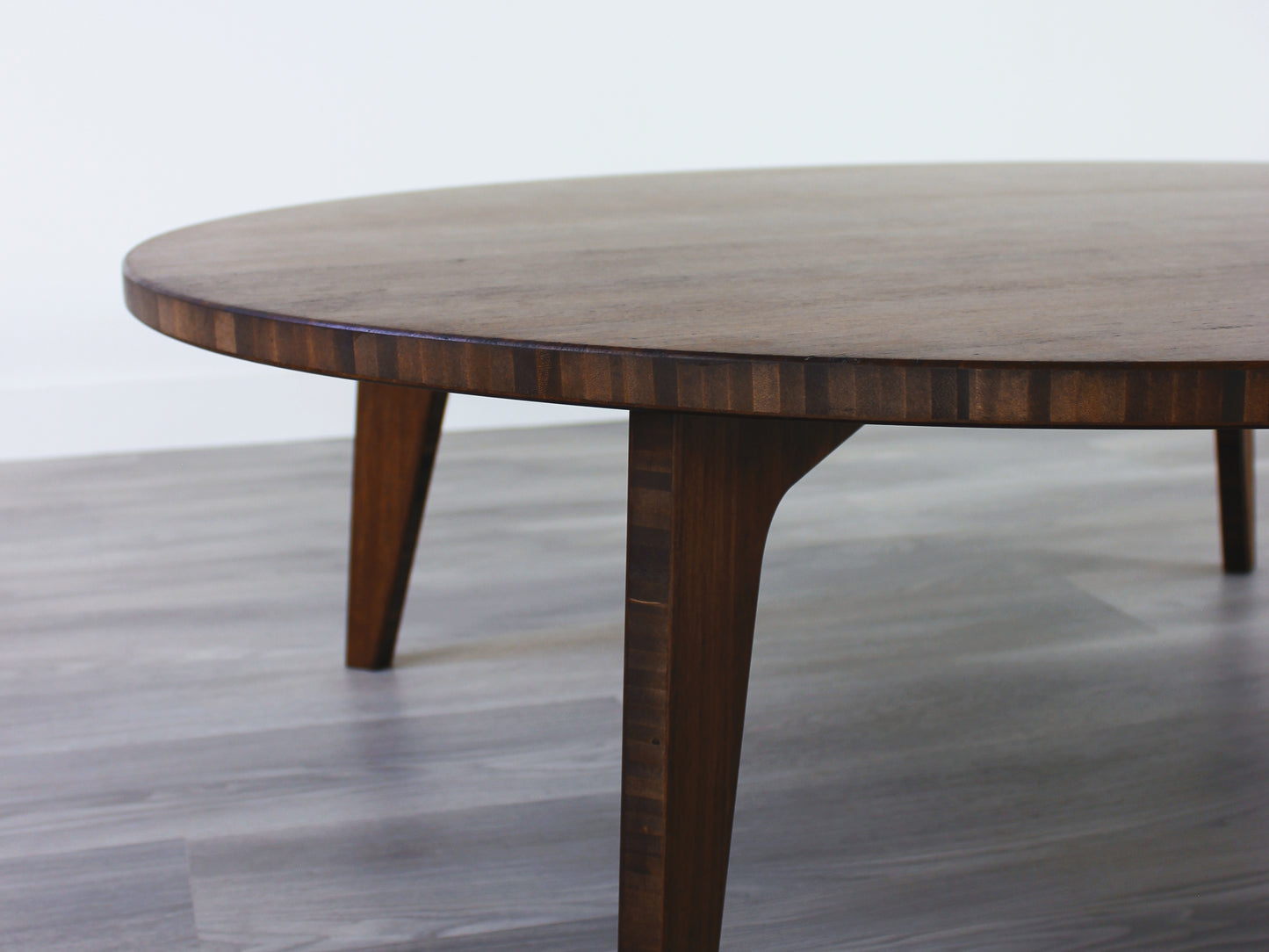 A round, walnut-colored bamboo table with a flat surface and curved legs on a gray floor.
Square low table
japanese furniture
japanese low table
low coffee table
low dining table
low table
mid century
minimalist
minimalist table
modern
chabudai
kotatsu
large coffee table