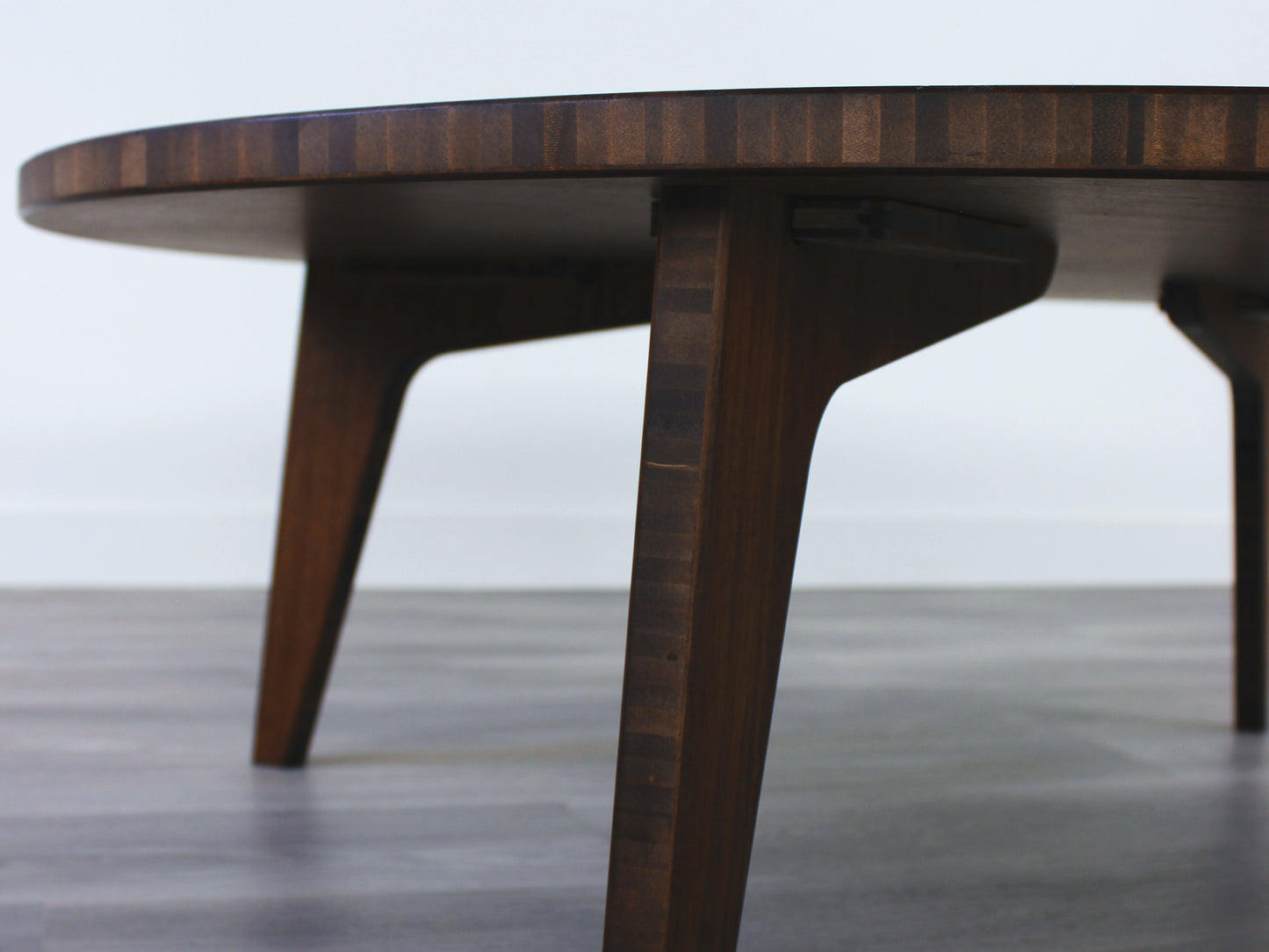 A round, walnut-colored bamboo table with a flat surface and curved legs on a gray floor.
Square low table
japanese furniture
japanese low table
low coffee table
low dining table
low table
mid century
minimalist
minimalist table
modern
chabudai
kotatsu
large coffee table