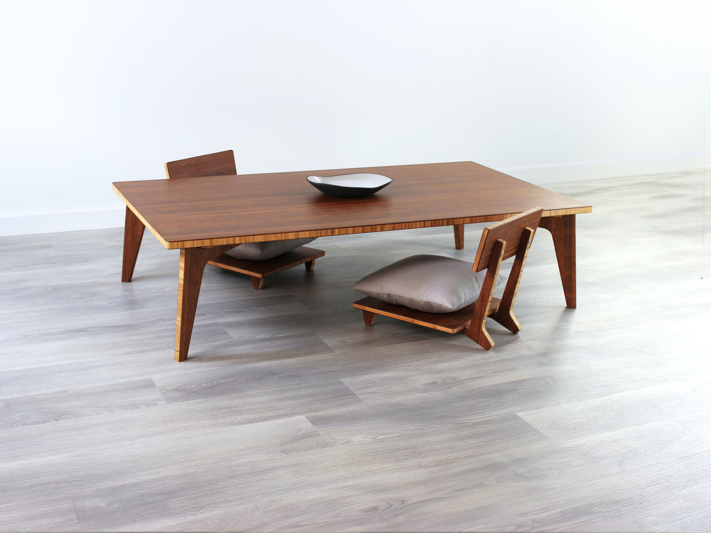 Large Rectangle Table Set - Chestnut. Set on a grey floor, against a white background. Two Floor Chair Comfort set underneath. A black pottery vessel on table top.
low table, coffee table, dining table, floor desk, floor chair, floor seating, low dining table, chabudai, tatami, kotatsu, minimalist, minimalist table,
modern, japanese low table, japanese table, kotatsu, large coffee table,
large dining table