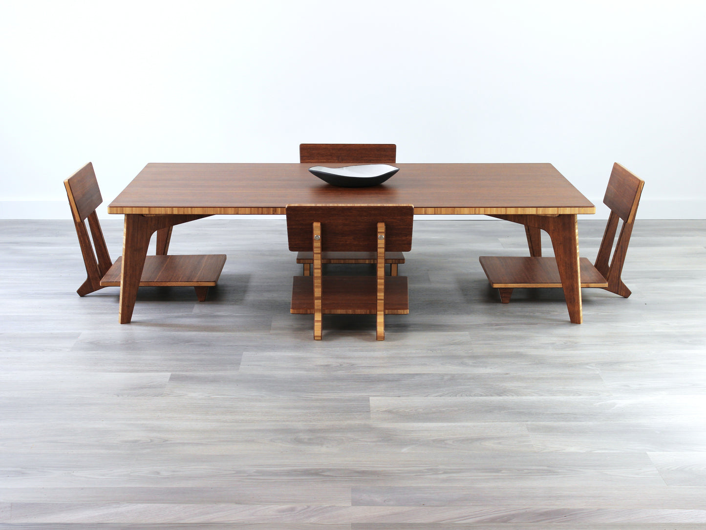 Large Rectangle Table Set - Chestnut. Set on a grey floor, against a white background. Four Floor Chair Comfort set underneath. A black pottery vessels on table top.
low table, coffee table, dining table, floor desk, floor chair, floor seating, low dining table, chabudai, tatami, kotatsu, minimalist, minimalist table,
modern, japanese low table, japanese table, kotatsu, large coffee table,
large dining table