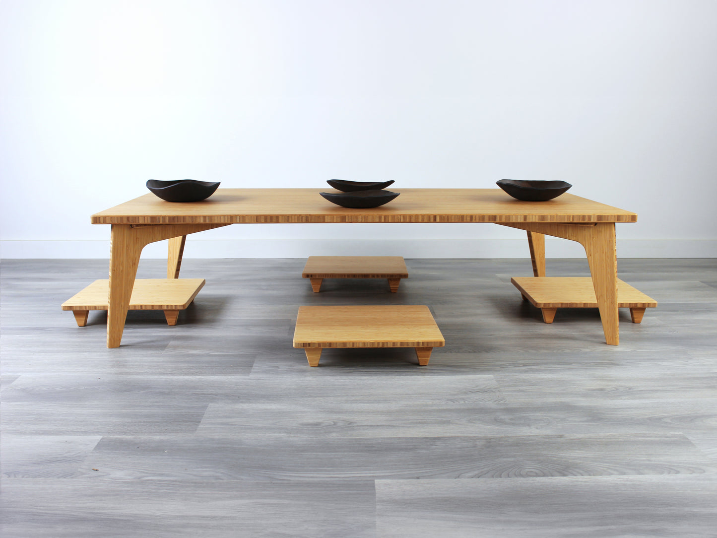 Large Rectangle Table Set - Natural. Set on a grey floor, against a white background. Four Floor Chair Posture set underneath. Multiple black pottery vessels on table top.
low table, coffee table, dining table, floor desk, floor chair, floor seating, low dining table, chabudai, tatami, kotatsu, minimalist, minimalist table,
modern, japanese low table, japanese table, kotatsu, large coffee table,
large dining table