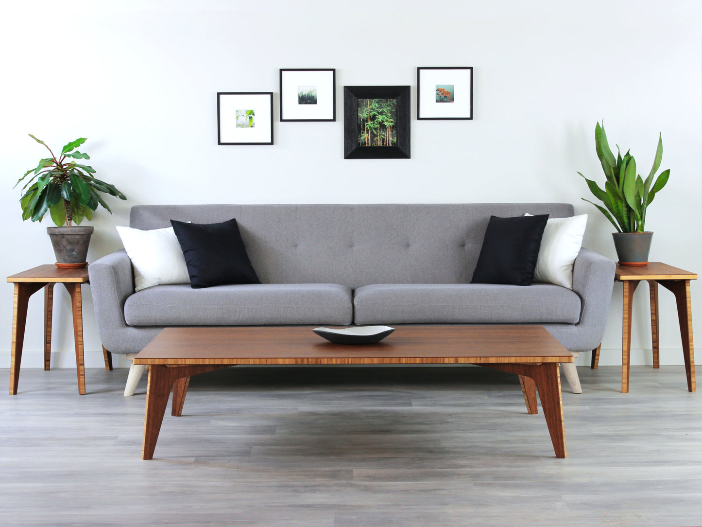 A large rectangular low table made of bamboo with a chestnut finish, placed on a grey floor, designed for multi-functional use in living spaces. A small black pottery vessel set on the table top.
japanese furniture
japanese low table
low coffee table
low dining table
low table
mid century
minimalist
minimalist table
modern
