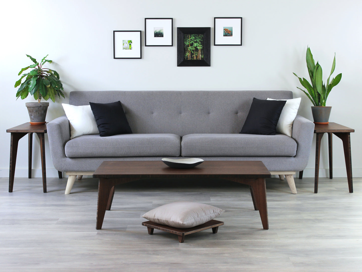 Small Rectangle LOW Table Set in bamboo with a walnut finish, featuring a Japandi style design, set on a grey floor with a white background. Set in a living room area, a grey couch and side tables with houseplants. A small black pottery vessel is placed on the table top.
low table, coffee table, dining table, floor desk, floor chair, floor seating, low dining table, chabudai, tatami, kotatsu, minimalist, minimalist table,
modern
