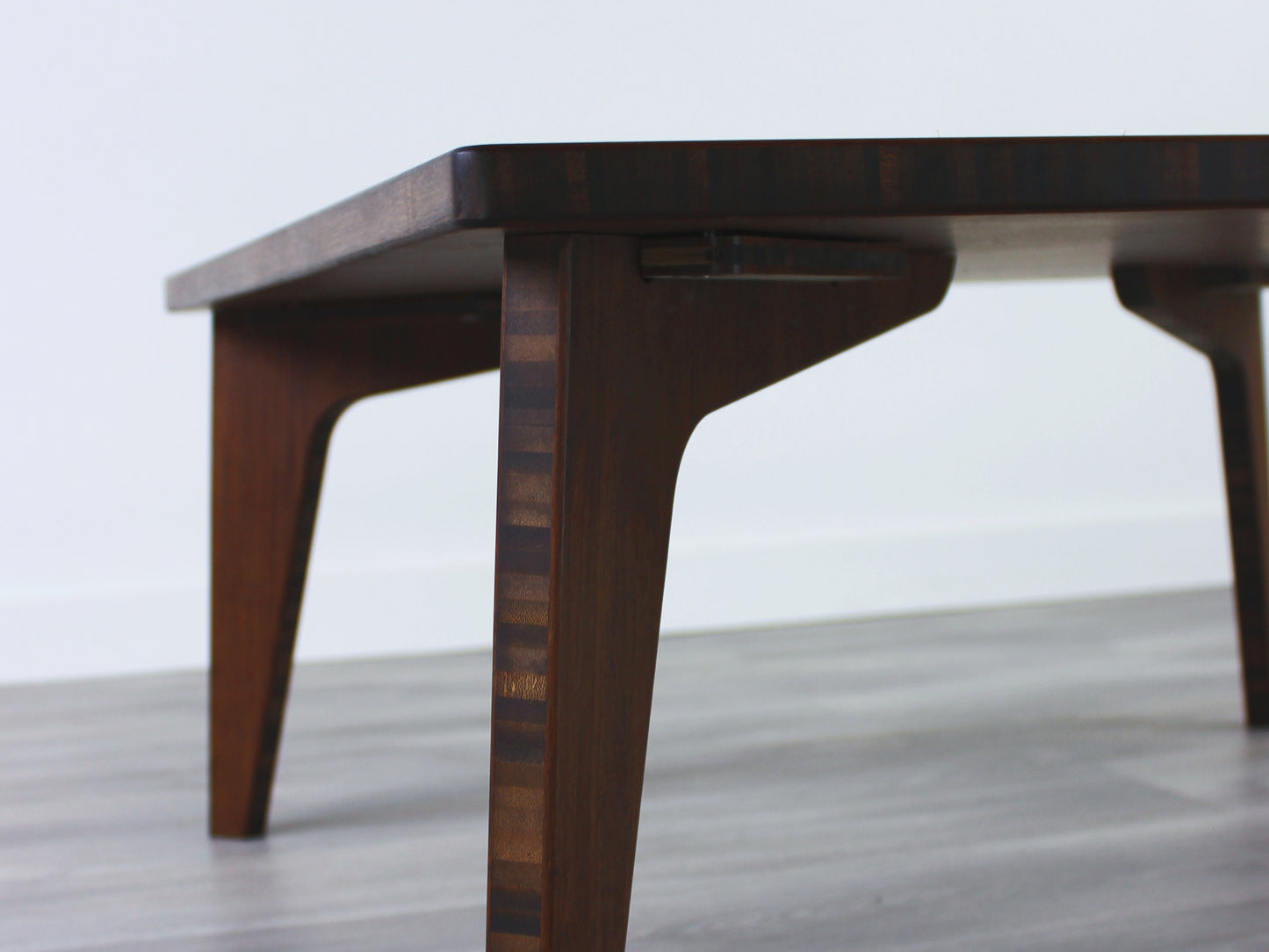 Small Square Table Set in walnut finish. Underside view, featuring handmade removable legs and hardware.
sustainable bamboo, renewable bamboo, solid bamboo, eco-friendly furniture, zero-waste, carbon neutral, natural materials, natural-based finish, repairable furniture