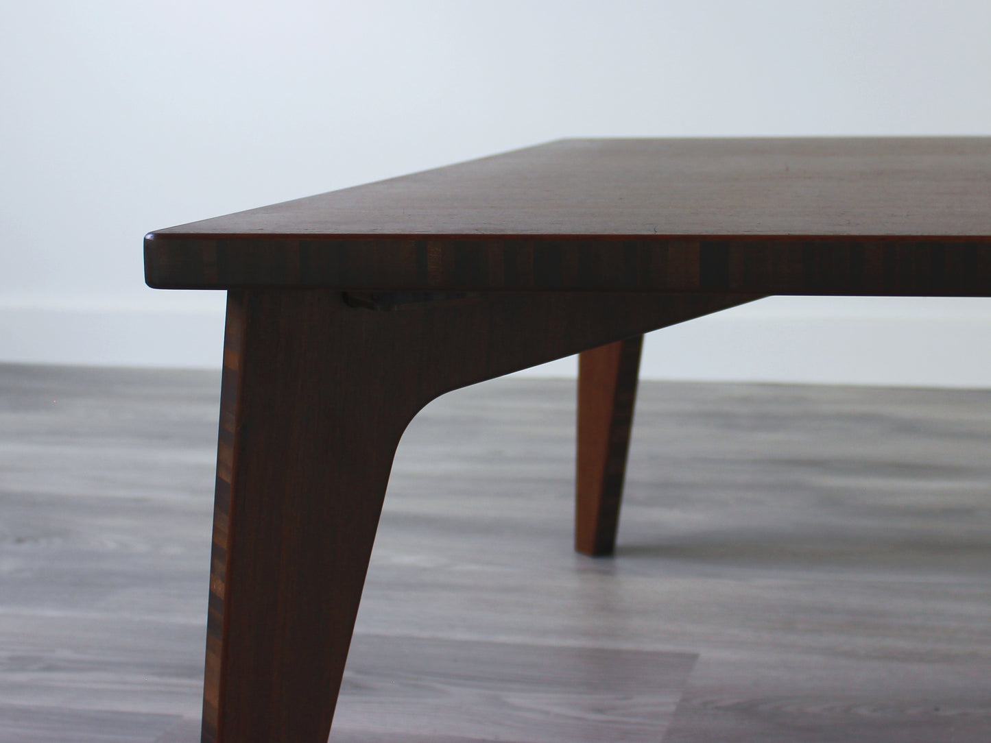Small Square Table Set in walnut finish. Up close view of the finish and grain.
sustainable bamboo, renewable bamboo, solid bamboo, eco-friendly furniture, zero-waste, carbon neutral, natural materials, natural-based finish, repairable furniture