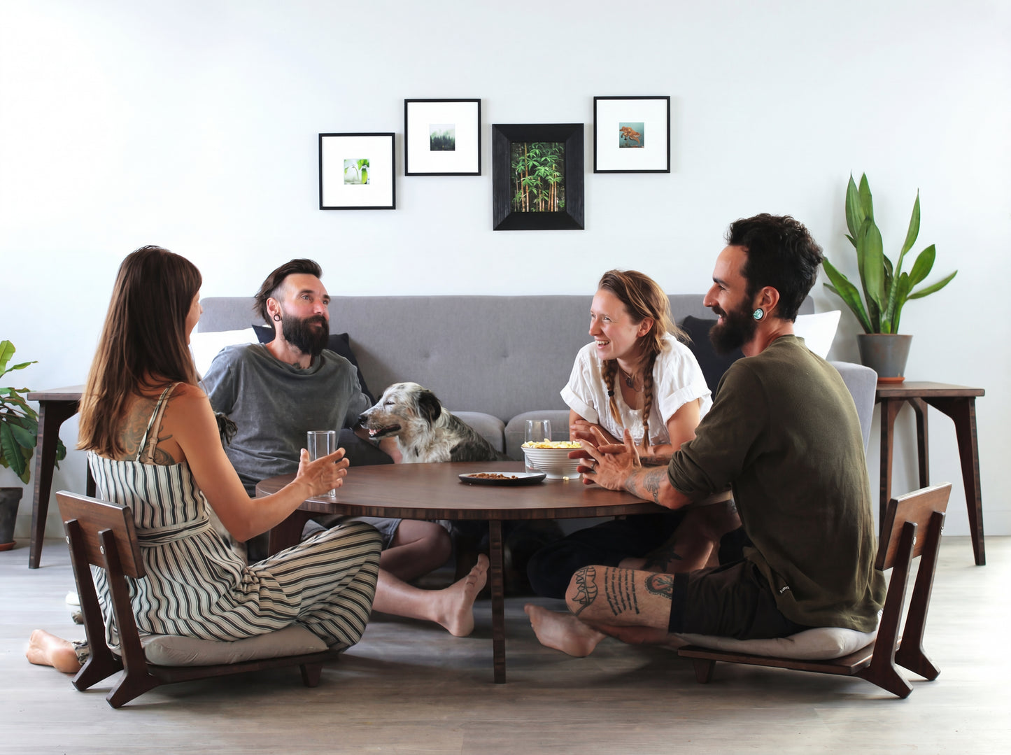 Four people sitting around a table in a modern living room with a dog.

Japandi, minimalist, mid-century, Japanese inspired, modern, contemporary, clean lines, organic design, sustainable bamboo, renewable bamboo, solid bamboo, eco-friendly furniture, natural materials, natural-based finish