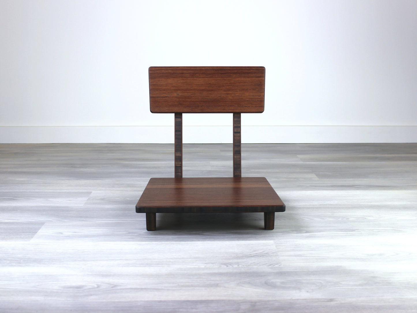 Sustainable walnut bamboo floor chair with ergonomic backrest, suitable for meditation, Kotatsu setups, and mid-century modern decor.

floor chair
chabudai
contemporary
low seating 
floor chair with back 
ergonomic 
posture support