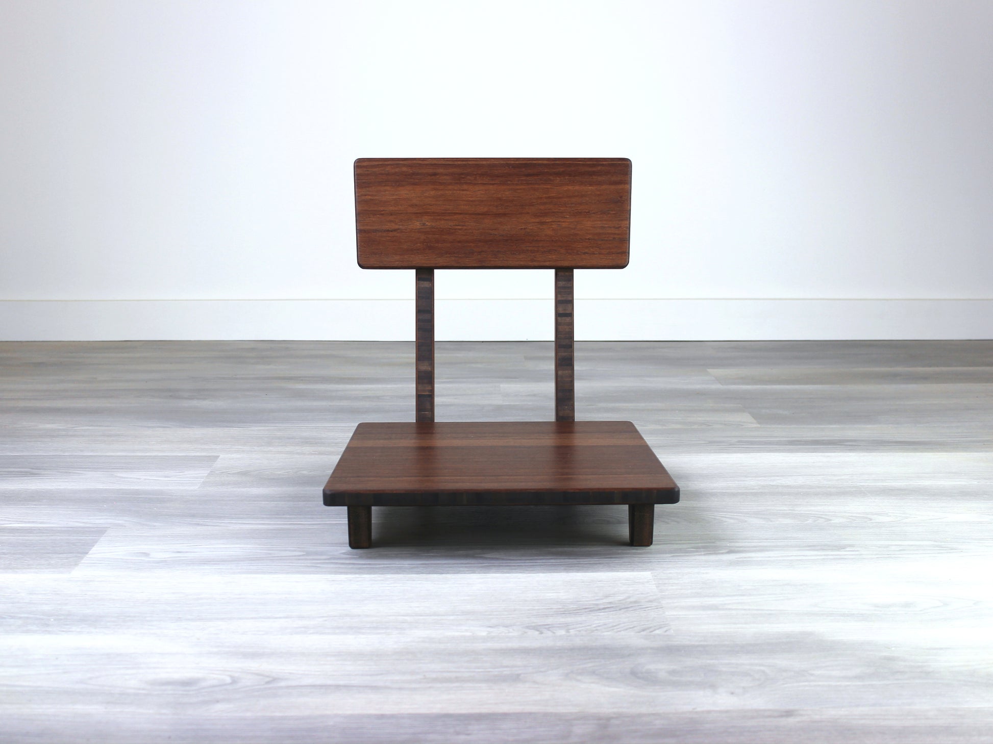 Sustainable walnut bamboo floor chair with ergonomic backrest, suitable for meditation, Kotatsu setups, and mid-century modern decor.

floor chair
chabudai
contemporary
low seating 
floor chair with back 
ergonomic 
posture support