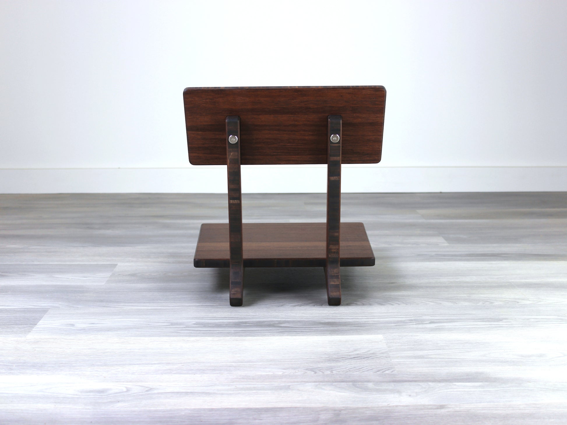 Sustainable walnut bamboo floor chair with ergonomic backrest, suitable for meditation, Kotatsu setups, and mid-century modern decor.

floor chair
chabudai
contemporary
low seating 
floor chair with back 
ergonomic 
posture support