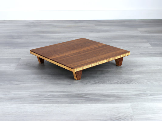 Chestnut Floor Chair Posture, placed on a grey floor and a white wall background. 

Meditation Chair 
Japanese Tea Table 
Kotatsu
low chair
posture support 
ergonomic 
minimilist 