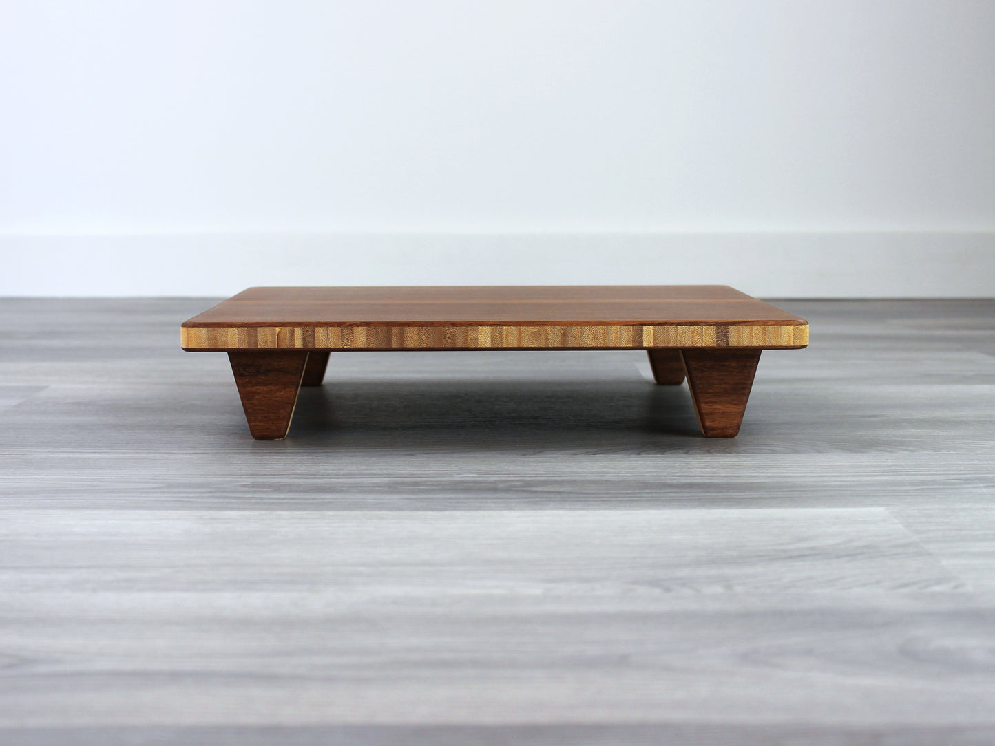 Chestnut Floor Chair Posture, placed on a grey floor and a white wall background. 

Meditation Chair 
Japanese Tea Table 
Kotatsu
low chair
posture support 
ergonomic 
minimilist