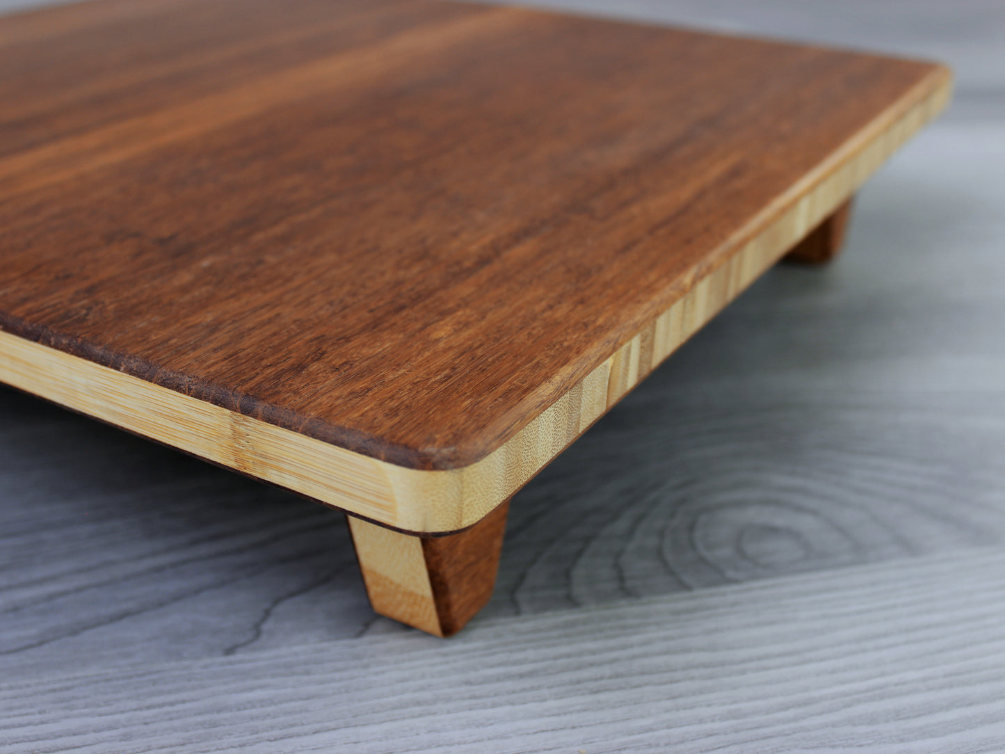 Chestnut Floor Chair Posture, placed on a grey floor and a white wall background. 

Meditation Chair 
Japanese Tea Table 
Kotatsu
low chair
posture support 
ergonomic 
minimilist