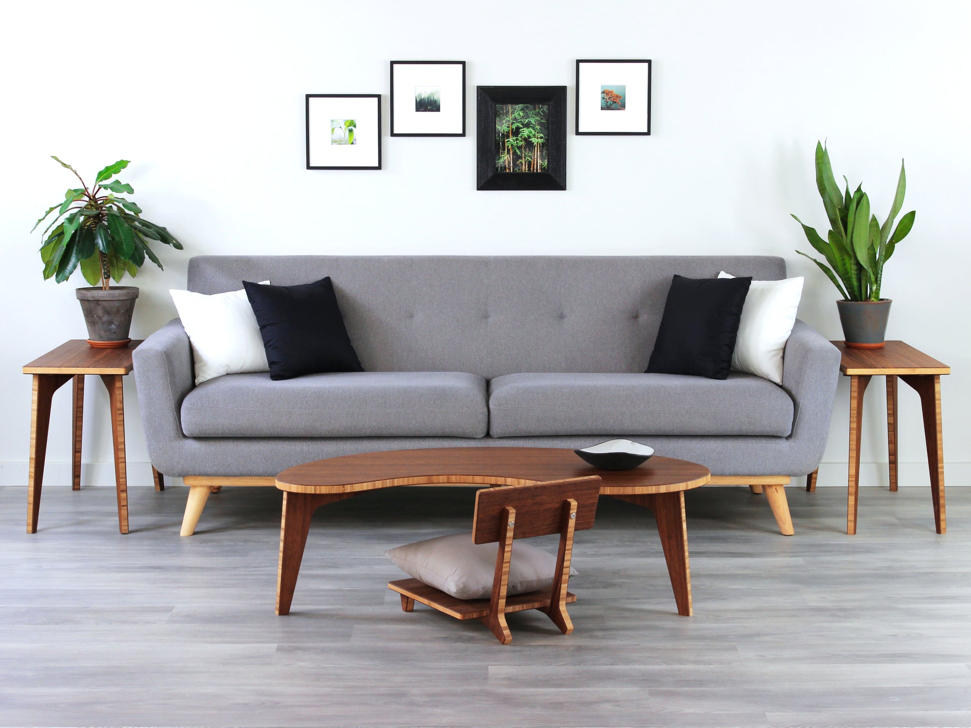 Kidney LOW Table Set in bamboo with a chestnut finish, featuring a Japandi style design, set on a grey floor with a white background. Set in a living room area, a grey couch and side tables with houseplants. A small black pottery vessel is placed on the table top. 

mid century modern low table
midcentury modern coffee table
floor table
japan coffee table
japan furniture
japan table
kidney coffee table 
bamboo low seating