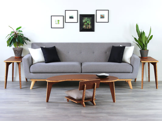 Kidney LOW Table Set in bamboo with a chestnut finish, featuring a Japandi style design, set on a grey floor with a white background. Set in a living room area, a grey couch and side tables with houseplants. A small black pottery vessel is placed on the table top. 

mid century modern low table
midcentury modern coffee table
floor table
japan coffee table
japan furniture
japan table
kidney coffee table 
bamboo low seating
