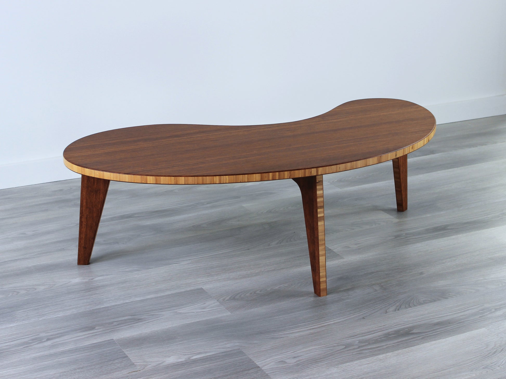 A Kidney LOW Table Set in chestnut bamboo. Placed on a Grey flooring with a white background. 

mid century modern low table
midcentury modern coffee table
floor table
japan coffee table
japan furniture
japan table
kidney coffee table 
bamboo low seating