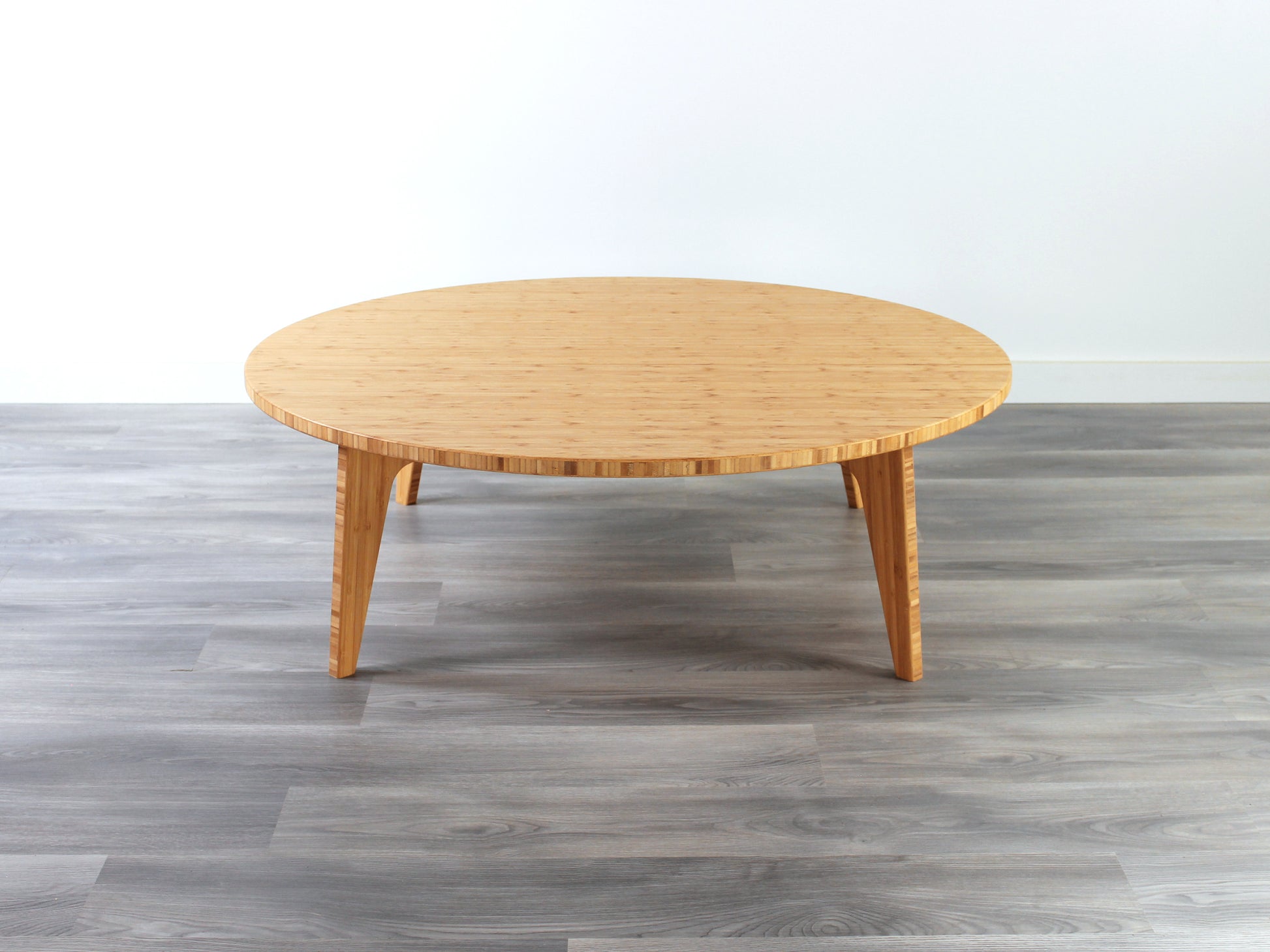 Custom Large circle bamboo table with Natural color finish, featuring a mid-century modern design, perfect for stylish interiors made in Canada.

japanese furniture
japanese low table
low coffee table
low dining table
low table
mid century
minimalist
minimalist table
modern