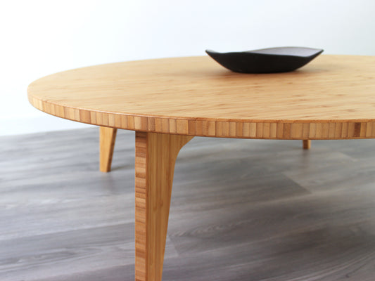 Custom large circle bamboo table with natural color finish, featuring a mid-century modern design, perfect for stylish interiors made in Canada.

japanese furniture
japanese low table
low coffee table
low dining table
low table
mid century
minimalist
minimalist table
modern
