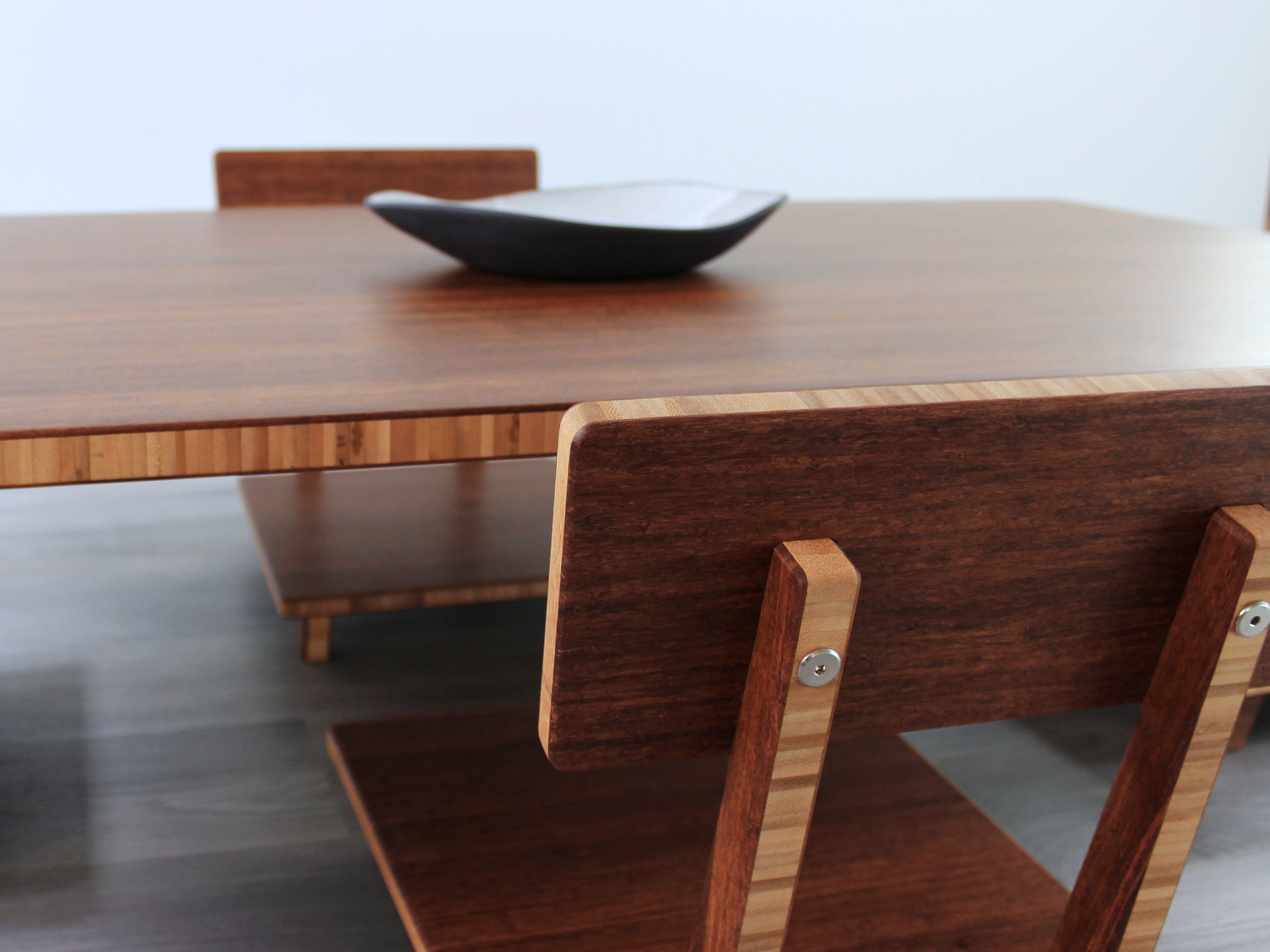 Large Rectangle Table Set - Chestnut. Set on a grey floor, against a white background. Two Floor Chair Posture set underneath. A black pottery vessels on table top.

low table, coffee table, dining table, floor desk, floor chair, floor seating, low dining table, chabudai, tatami, kotatsu, minimalist, minimalist table,
modern, japanese low table, japanese table, kotatsu, large coffee table,
large dining table