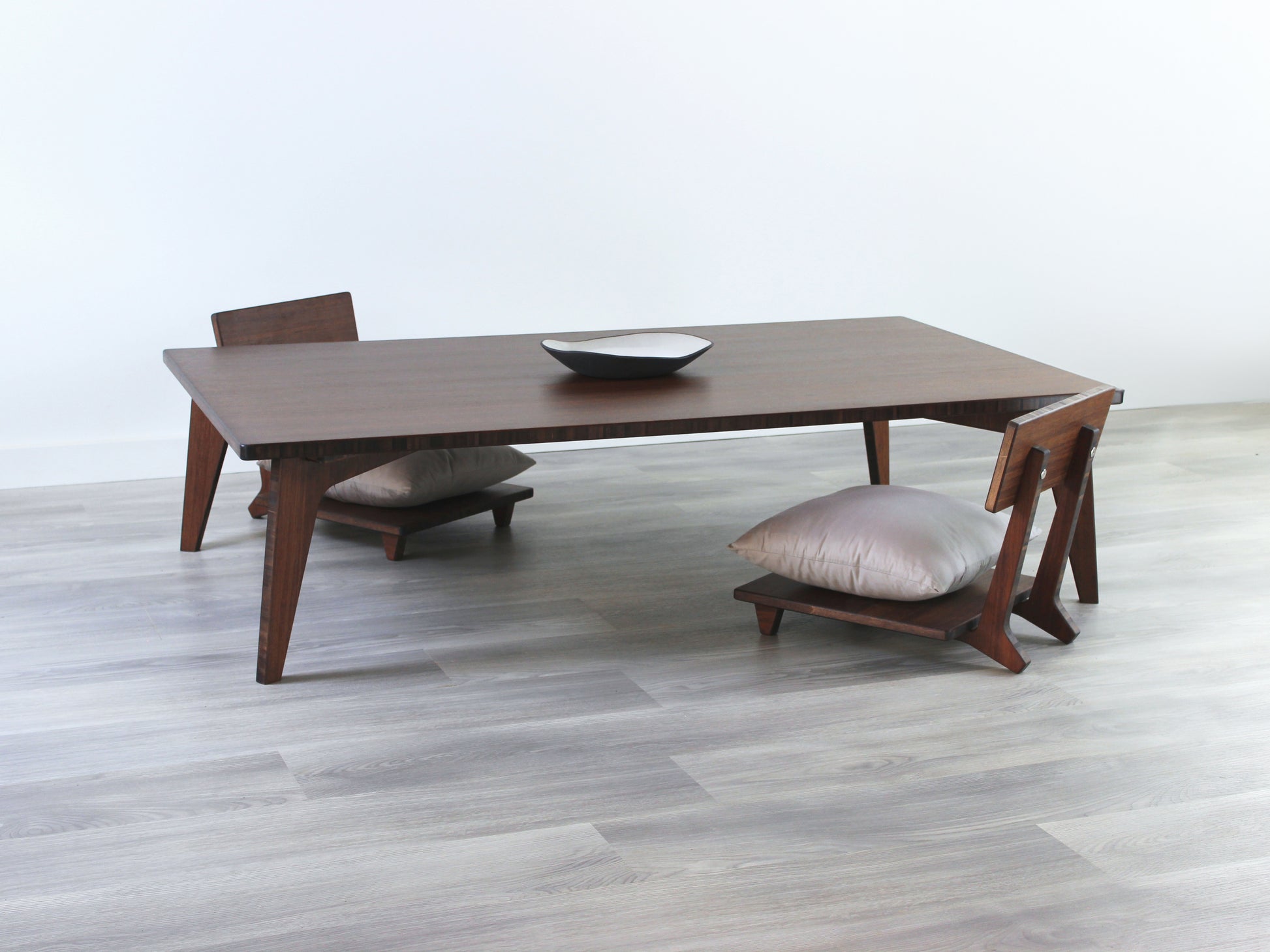Large Rectangle Table Set - Walnut. Set on a grey floor, against a white background. Two Floor Chair Comfort set underneath. A black pottery vessel on table top.

low table, coffee table, dining table, floor desk, floor chair, floor seating, low dining table, chabudai, tatami, kotatsu, minimalist, minimalist table,
modern, japanese low table, japanese table, kotatsu, large coffee table,
large dining table
