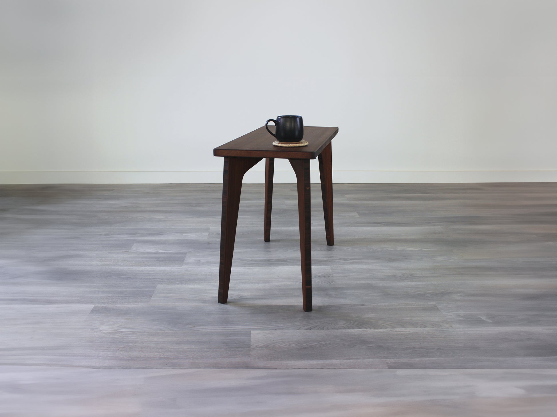mid century
minimalist
minimalist table
modern
bamboo side table 
walnut 
coffee mug on side table