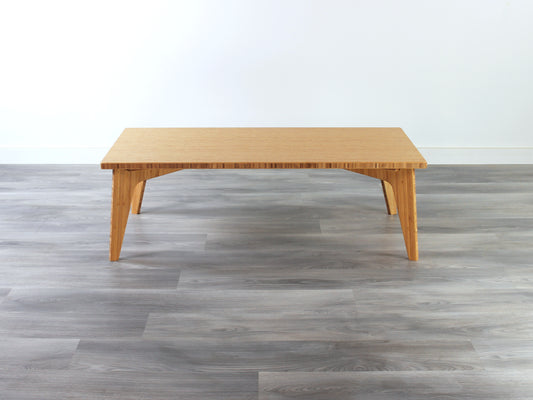 A rectangular low table made of bamboo with a natural finish, placed on a grey floor, designed for multi-functional use in living spaces.

japanese furniture
japanese low table
low coffee table
low dining table
low table
mid century
minimalist
minimalist table
modern
