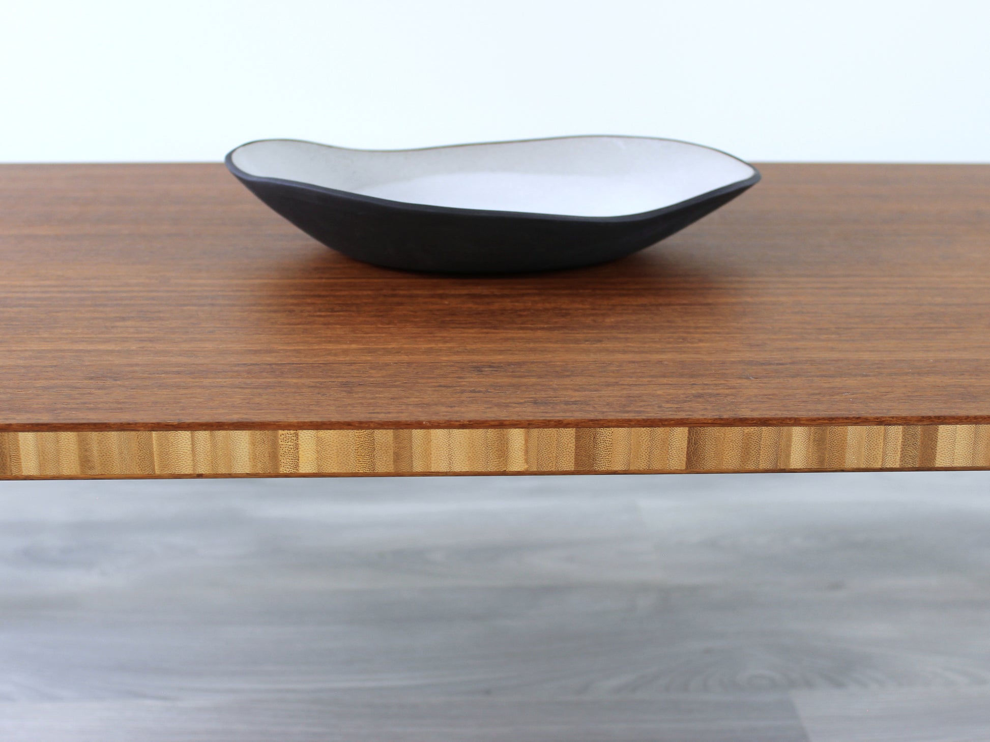 Small Rectangle Table Set - Chestnut, placed on a grey floor, against a white background. A small black pottery vessel is on the table top. 

low table, coffee table, dining table, floor desk, floor chair, floor seating, low dining table, chabudai, tatami, kotatsu, minimalist, minimalist table,
modern
