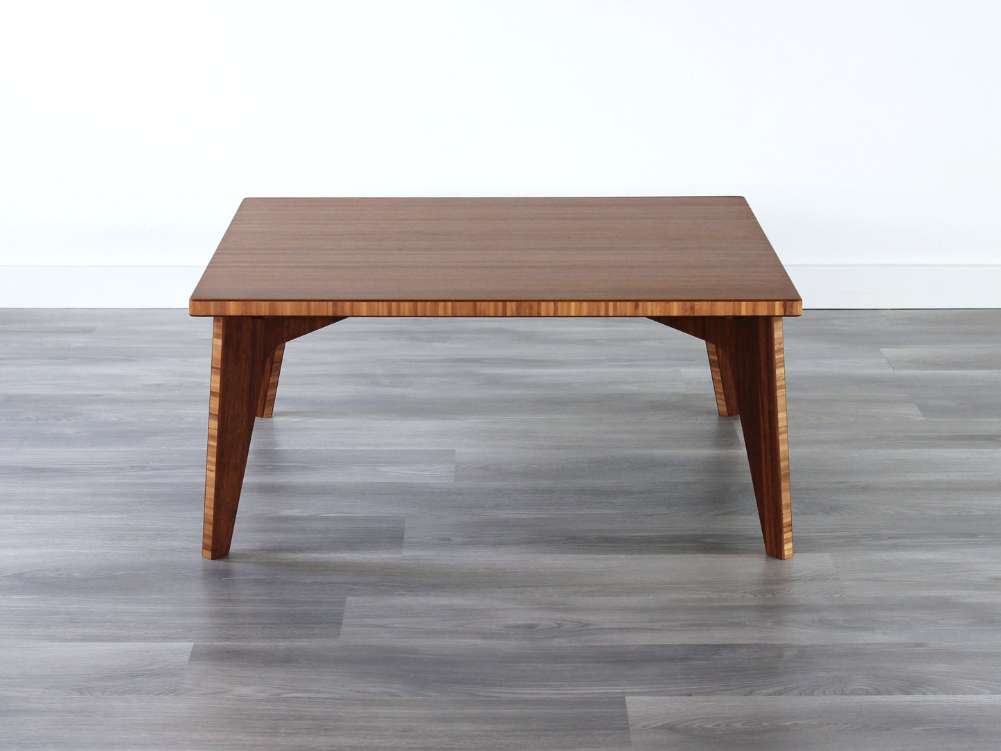 Small Square Table with chestnut bamboo finish. Grey flooring with a white background. 

mid century modern low table
midcentury modern coffee table
floor table
japan coffee table
japan furniture
japan table
small coffee table 
bamboo low table