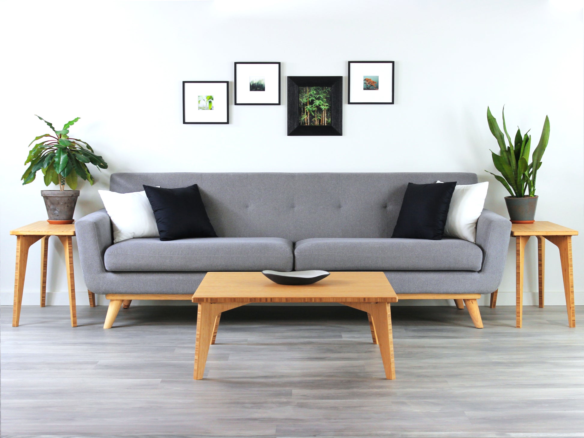 Small Square Table bamboo with a natural finish, featuring a Japandi style design, set on a grey floor with a white background. Set in a living room area, a grey couch and side tables with houseplants. A small black pottery vessel is placed on the table top. 

mid century modern low table
midcentury modern coffee table
floor table
japan coffee table
japan furniture
japan table
small coffee table 
bamboo low table