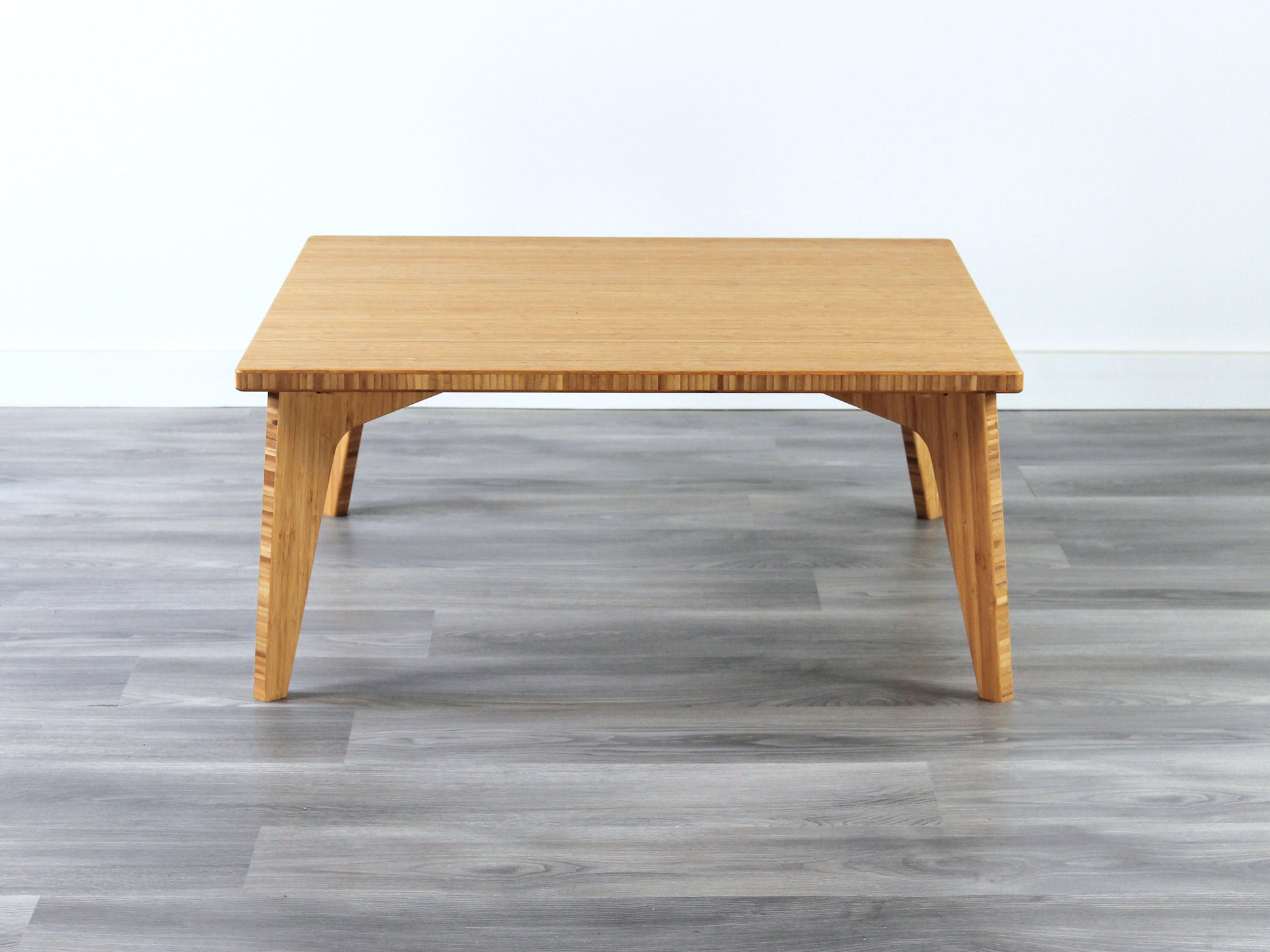 Small Square Table with natural bamboo finish. Grey flooring with a white background. 

mid century modern low table
midcentury modern coffee table
floor table
japan coffee table
japan furniture
japan table
small coffee table 
bamboo low table