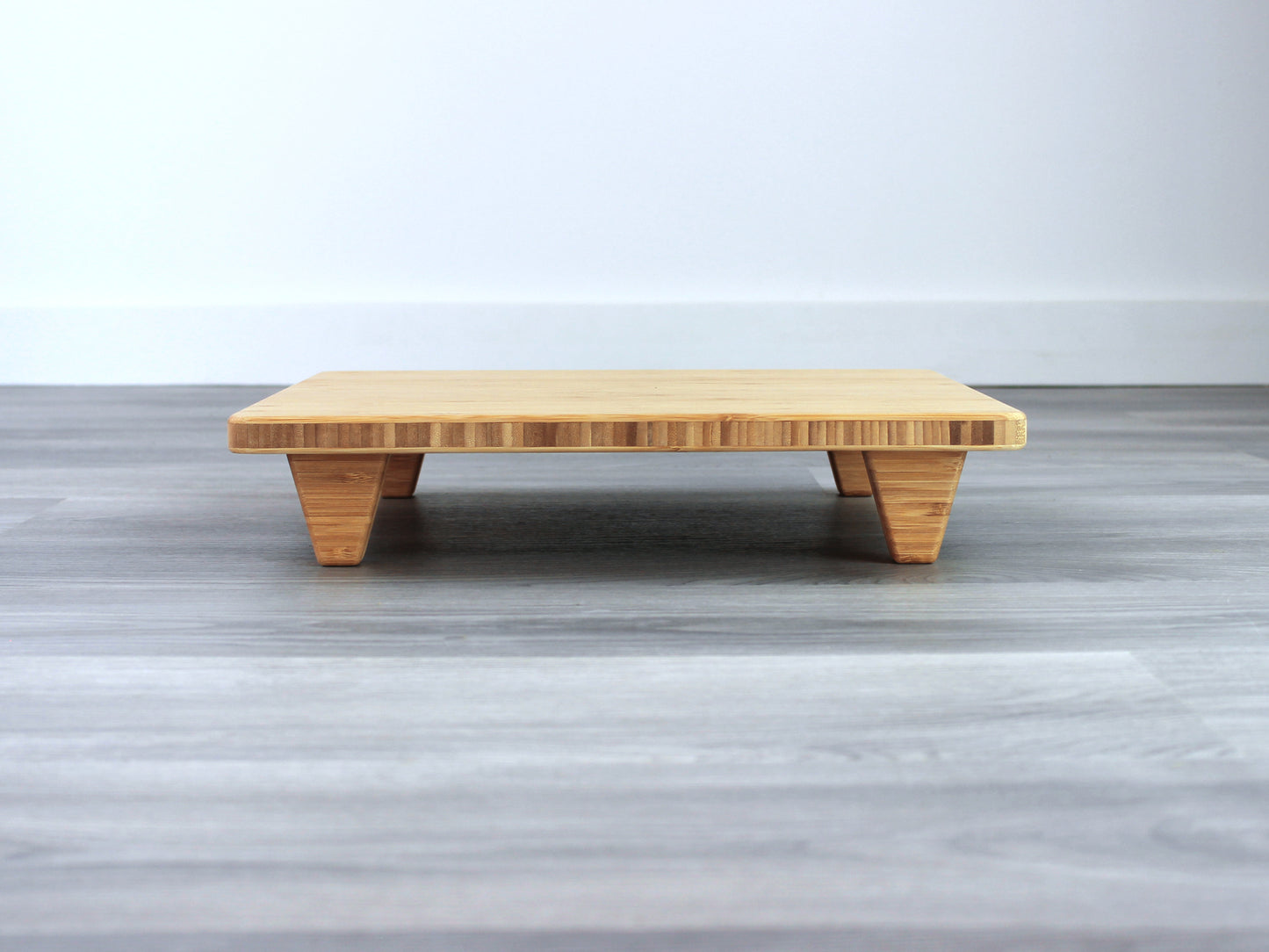 Natural Floor Chair Posture, placed on a grey floor and a white wall background. 

Meditation Chair 
Japanese Tea Table 
Kotatsu
low chair
posture support 
ergonomic 
minimilist 