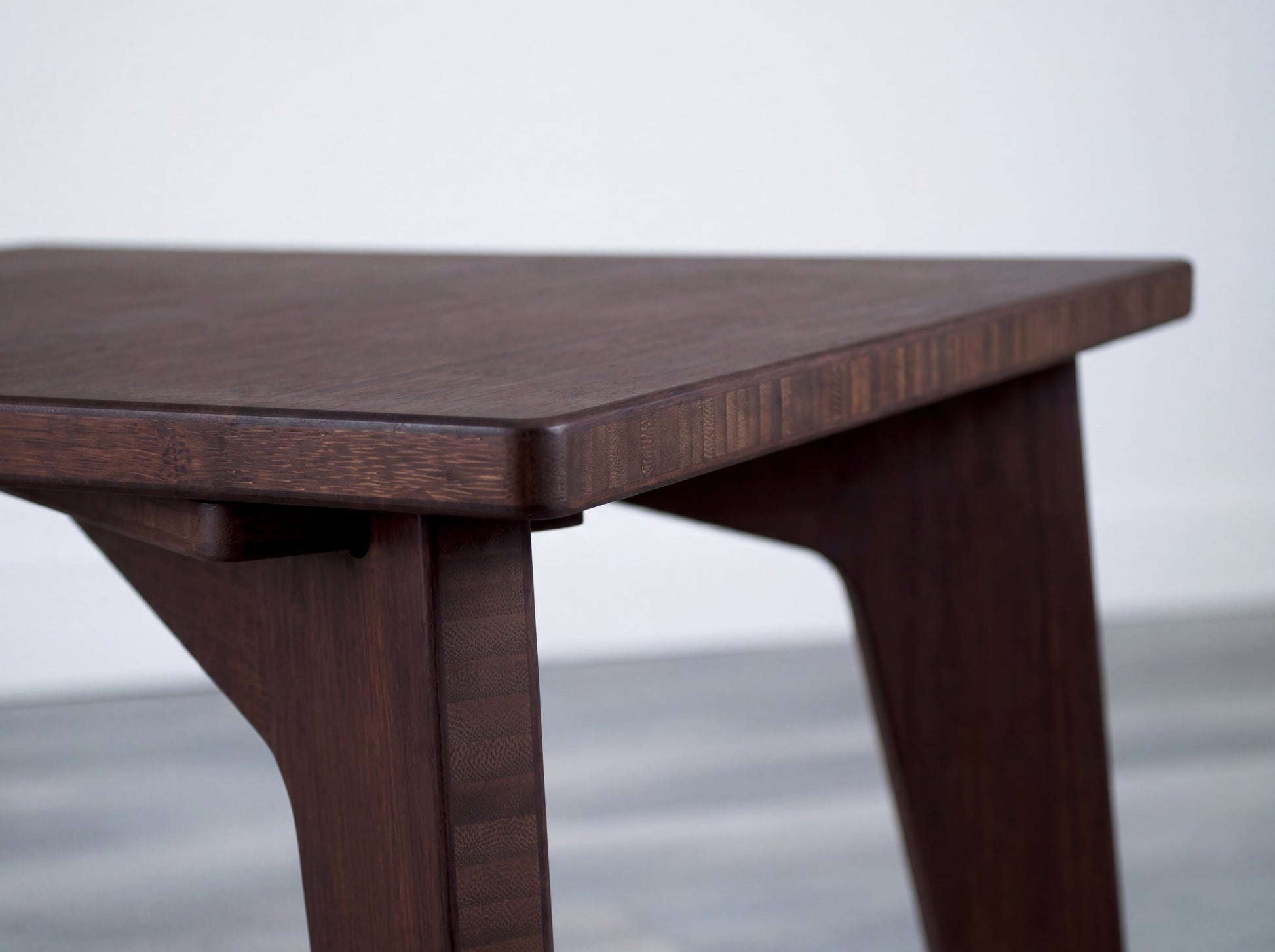 bamboo walnut chair base closeup