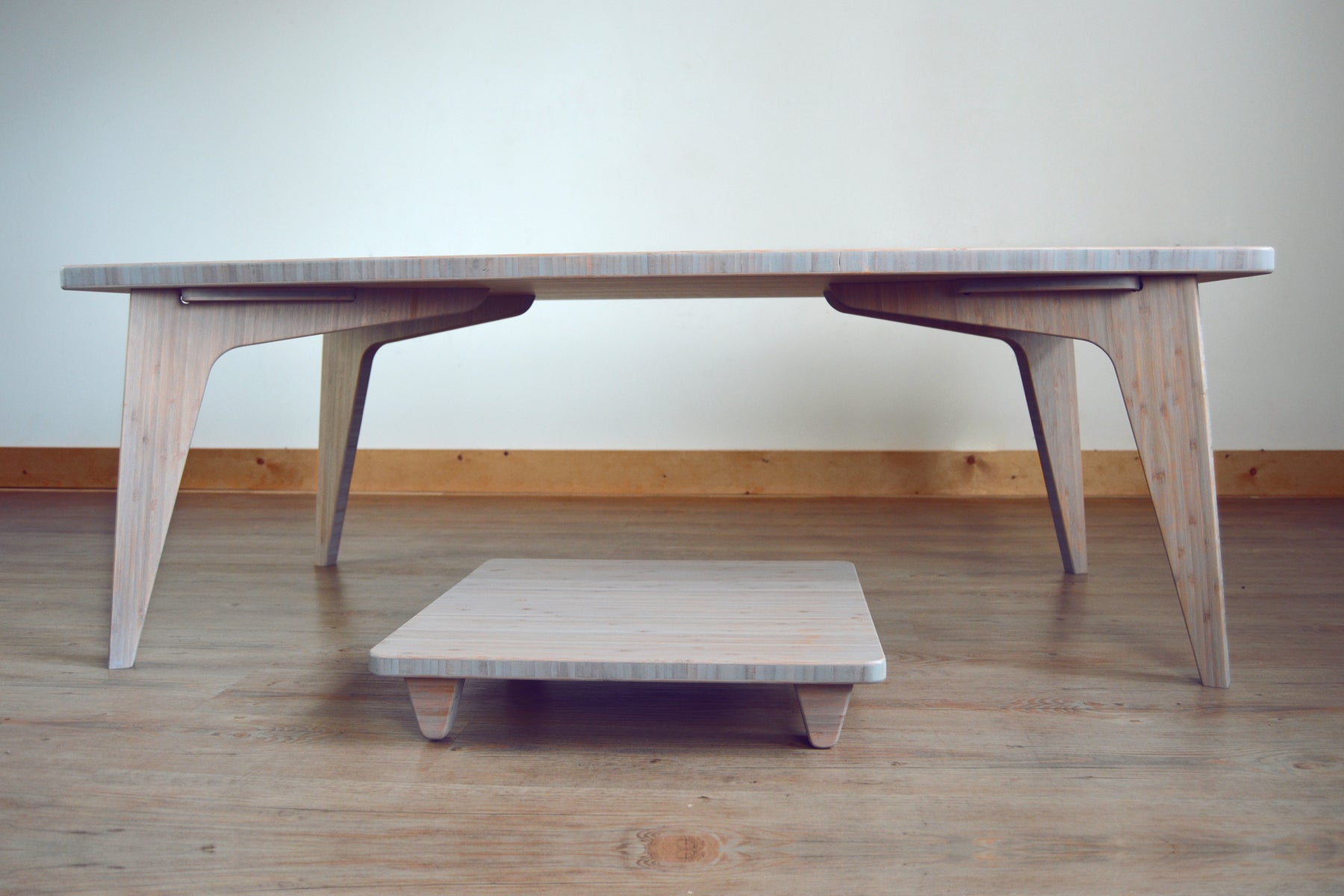 Grey bamboo table with pillow lift. Japanese, mid-century, Scandinavian and contemporary inspired. Sustainable wood alternative, made from solid grass.