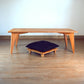 Natural bamboo table with pillow lfits. Japanese, mid-century, Scandinavian and contemporary inspired. Sustainable wood alternative, made from solid grass.